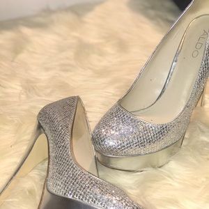 Pizzazz, sparkly heel slightly worn